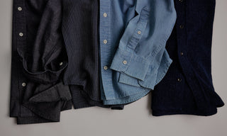 An assortment of men's oxford shirts from Taylor Stitch