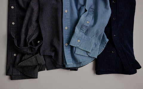 An assortment of men's oxford shirts from Taylor Stitch