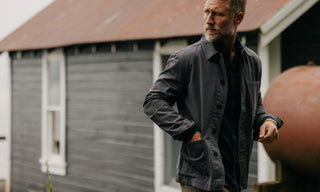 fit model walking wearing The Ojai Jacket in Organic Charcoal Foundation Twill