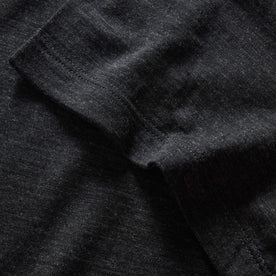 material shot of the sleeve cuff on The Merino Tee in Heather Black, Knits by Taylor Stitch