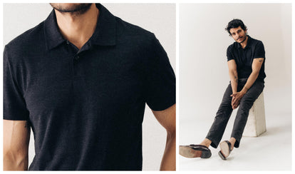 fit model sitting wearing The Merino Polo in Heather Black