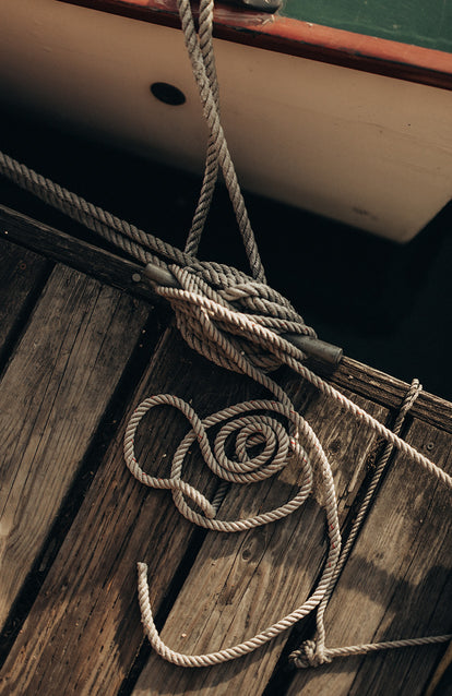 Mooring lines tied to a dock.