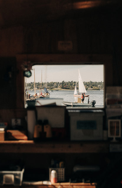 View of sail boats from a cabin window.