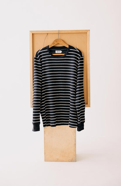 editorial image of The Adams Crew in Dark Navy Stripe Reverse Terry on a hanger
