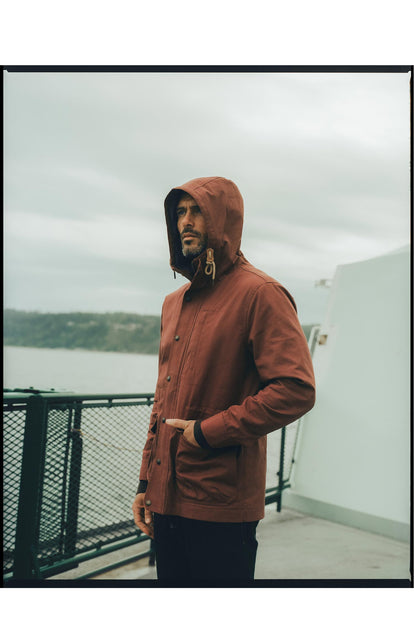 fit model with his hand in the pocket of The Explorer Jacket in Red Wine Dry Wax