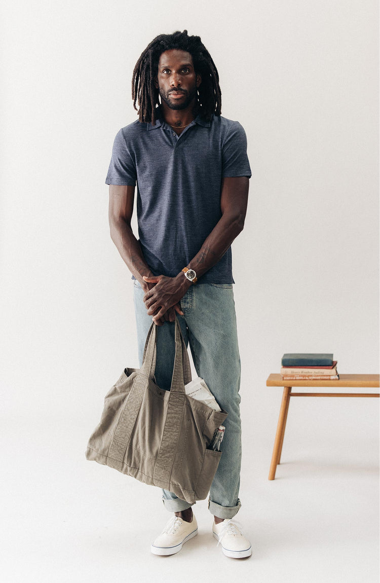 fit model holding The Foundation Tote in Organic Smoked Olive