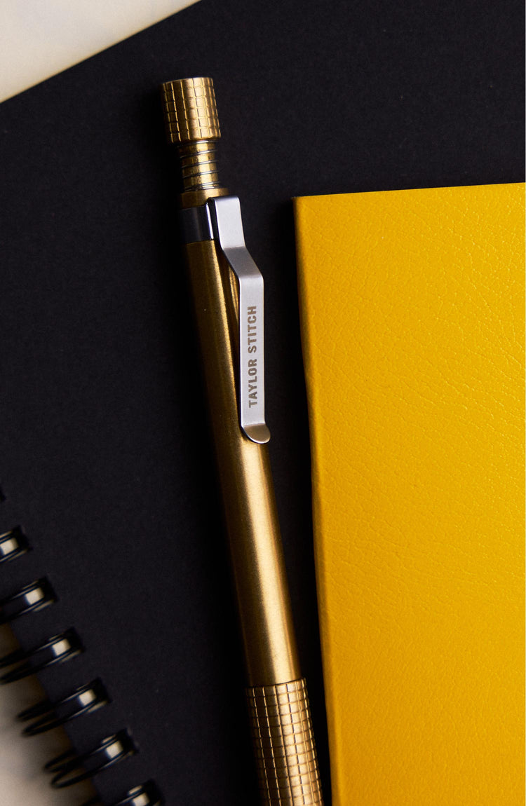 editorial image of The Mechanical Pencil in Brass on a notebook