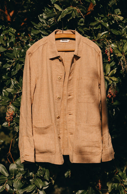 editorial image of The Ojai Jacket in Chili Stripe Linen on a hanger