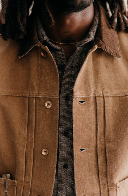 fit model showing off the buttons on The Ryder Jacket in Tobacco Chipped Canvas