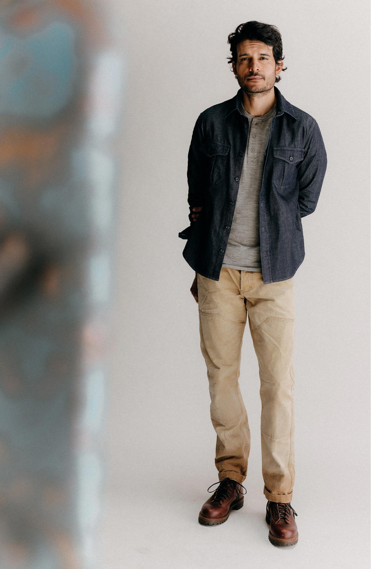 fit model standing wearing The Saddler Shirt in Indigo Broken Twill