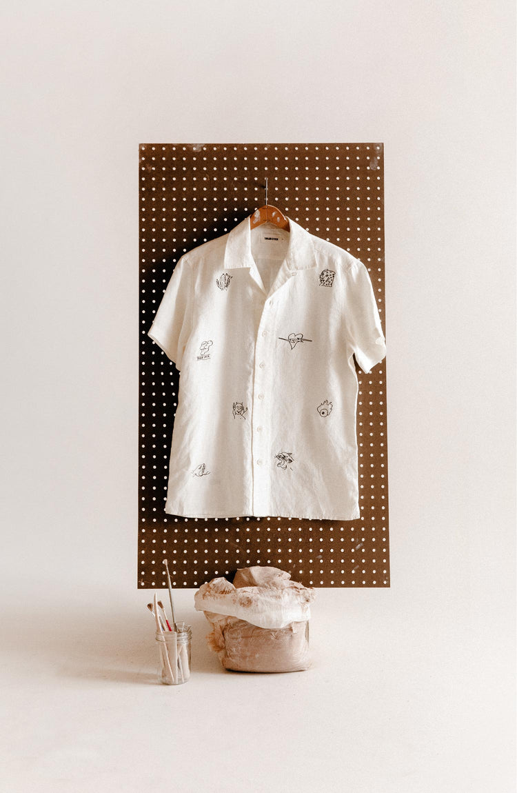 editorial image of The Short Sleeve Davis Shirt in Embroidered Natural on a hanger