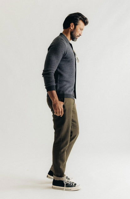 fit model walking wearing The Carmel Pant in Heather Olive Cotton Linen