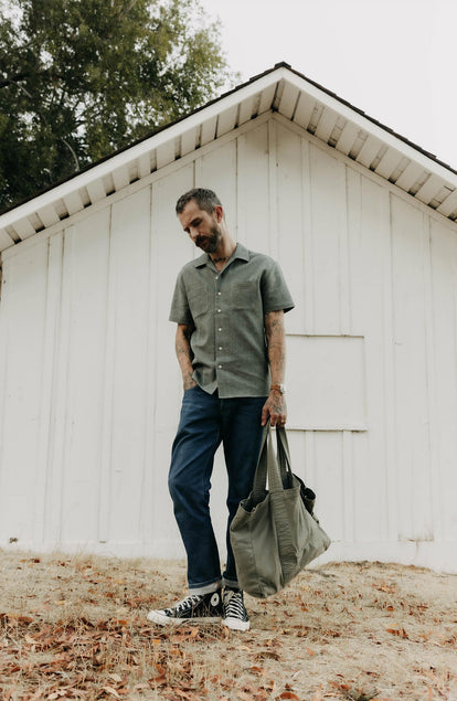 fit model standing wearing The Conrad Shirt in Deep Sea Twist