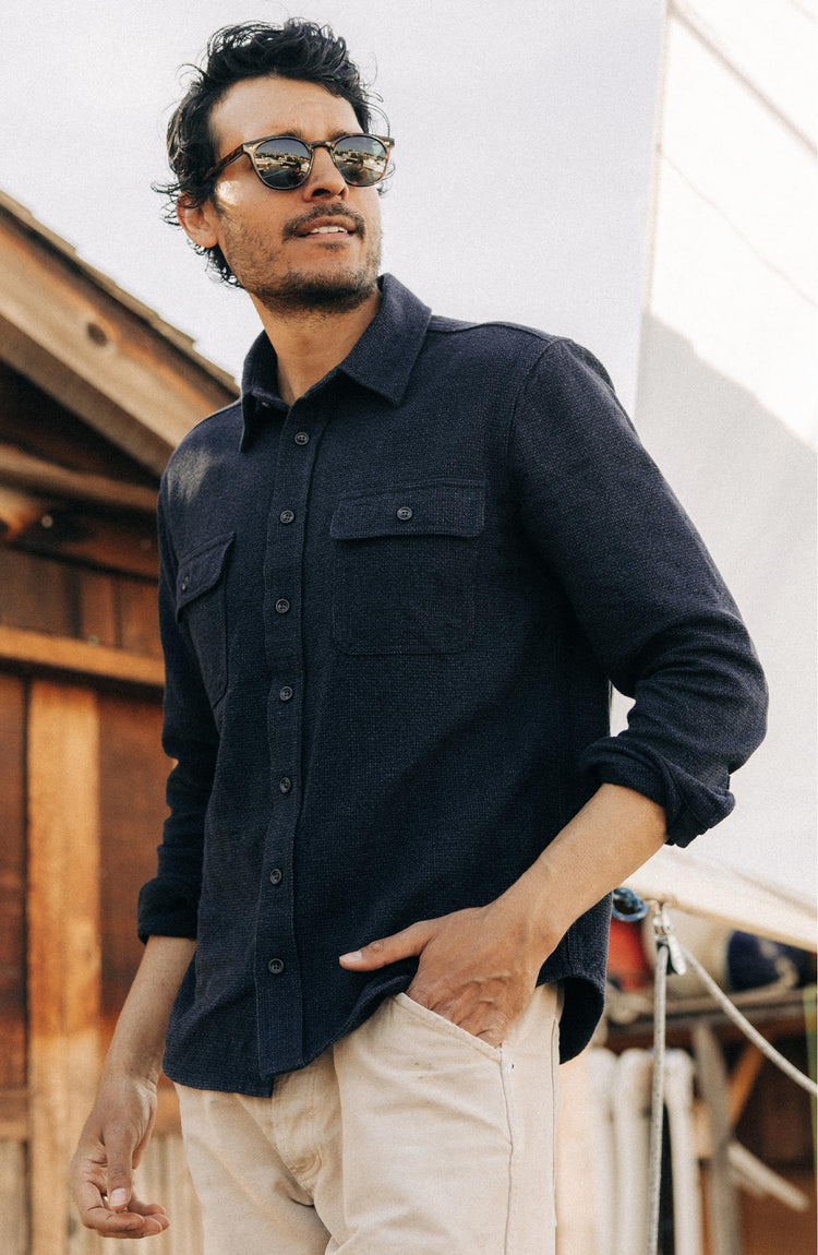 fit model posing in The Ledge Shirt in Dark Navy Linen Tweed