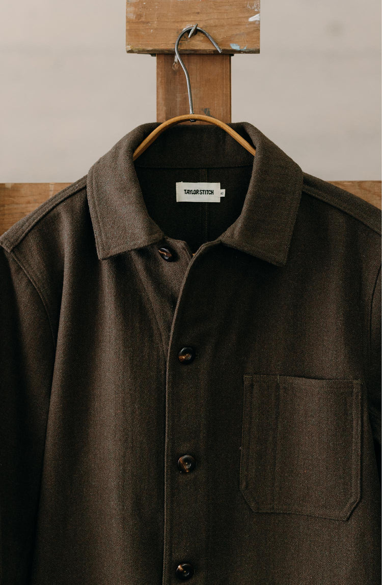 editorial image of The Ojai Jacket in Army Herringbone Wool hanging