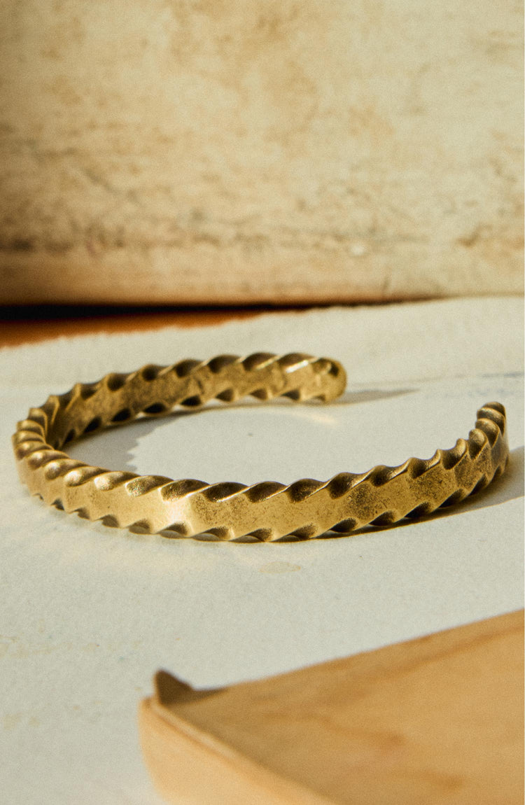 editorial image of the front of The Twisted Cuff in Brass