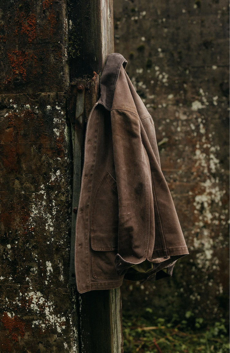 editorial image of The Upland Jacket in Aged Penny Chipped Canvas hanging