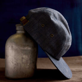 editorial image of the side of The 5-Panel Cap in Washed Indigo, Accessories by Taylor Stitch