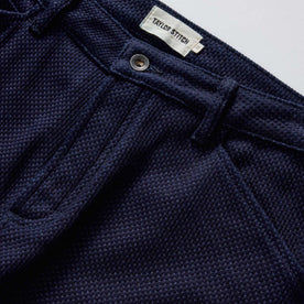 material shot of the waistband on The Camp Pant in Rigid Indigo Sashiko, Bottoms by Taylor Stitch