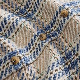 material shot of the buttons on The Cutter Overshirt in Sandbar Plaid, Wovens by Taylor Stitch