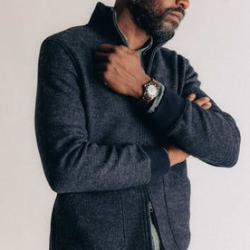 fit model posing in The Evans Jacket in Navy Birdseye Wool, Knits by Taylor Stitch