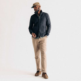 fit model posing in The Evans Jacket in Navy Birdseye Wool, Knits by Taylor Stitch