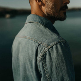 fit model showing off the shoulder on The Milton Pullover in Washed Selvedge Denim, Wovens by Taylor Stitch