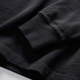 material shot of the sleeve on The Rugby Shirt in Coal, Knits by Taylor Stitch