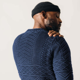 fit model showing off the back of The Bedford Sweater in Navy, Knits by Taylor Stitch