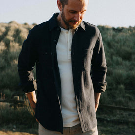 fit model posing in The Coastline Knit Shirt in Dark Navy, Knits by Taylor Stitch