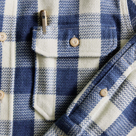 editorial flatlay of the pocket on The Division Shirt in Washed Indigo Check, Wovens by Taylor Stitch