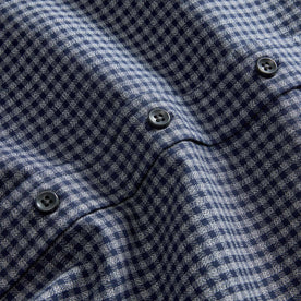 material shot of the buttons on The Jack in Marine Check, Wovens by Taylor Stitch