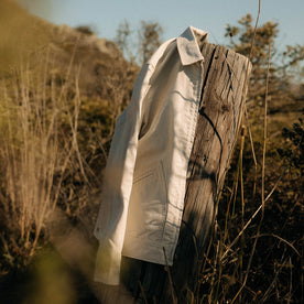 editorial image of The Shifter Jacket in Stone Pigment Canvas on a stick, Outerwear by Taylor Stitch