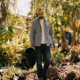 fit model walking wearing The Shop Shirt in Rinsed Indigo Selvedge, Wovens by Taylor Stitch