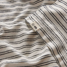 material shot of the bottom hem on The Cotton Hemp Tee in Black Coffee Stripe, Knits by Taylor Stitch