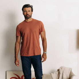 fit model posing in The Cotton Hemp Tee in Fired Clay, Knits by Taylor Stitch