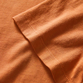 material shot of the sleeves on The Organic Cotton Tee in Adobe