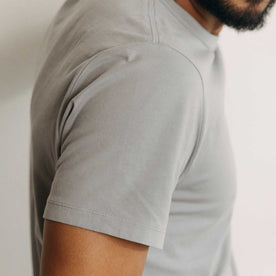 fit model showing off the sleeves on The Organic Cotton Tee in Overcast