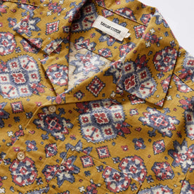 material shot of the collar on The Short Sleeve Davis Shirt in Tarnished Gold Print