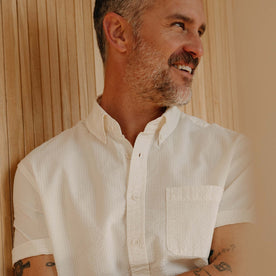 fit model showing off the front of The Short Sleeve Jack in Natural Seersucker