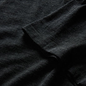 material shot of the sleeves on The Merino Polo in Heather Black, Knits by Taylor Stitch