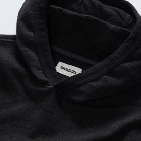 material shot of the hoodie on The Apres Hoodie in Black Indigo Terry, Knits by Taylor Stitch