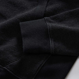 material shot of the sleeves on The Apres Hoodie in Black Indigo Terry, Knits by Taylor Stitch