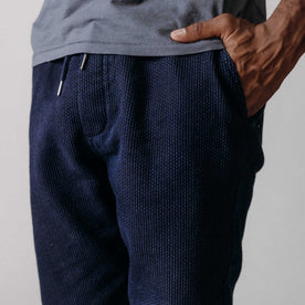 editorial image of the bottom cuffs on The Apres Pant in Rinsed Indigo Sashiko, Bottoms by Taylor Stitch