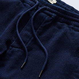 material shot of the waistband on The Apres Pant in Rinsed Indigo Sashiko, Bottoms by Taylor Stitch