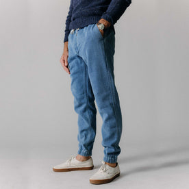 fit model with his hand in his pocket of The Apres Pant in Washed Indigo Sashiko, Bottoms by Taylor Stitch