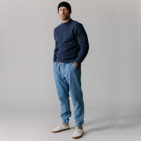 fit model standing wearing The Apres Pant in Washed Indigo Sashiko, Bottoms by Taylor Stitch