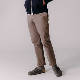 fit model posing in The Democratic Foundation Pant in Organic Espresso, Bottoms by Taylor Stitch