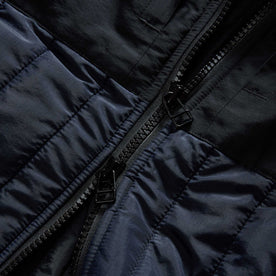 material shot of the zipper on The Ember Jacket in Dark Navy Quilted Nylon, Outerwear by Taylor Stitch