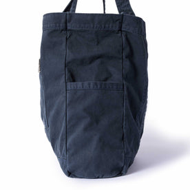 editorial image of the side pocket on The Foundation Tote in Organic Navy, Accessories by Taylor Stitch